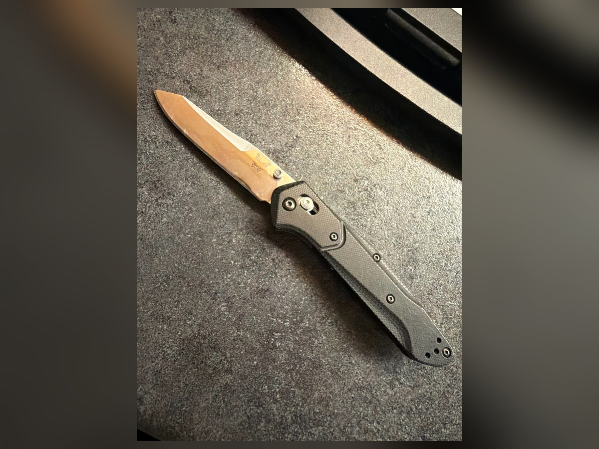 Folding knife on workbench